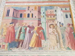 Affreschi di Benozzo Gozzoli nella cappella maggiore, scena della rinuncia ai beni paterni