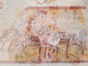 San Bevignate a Perugia, l'affresco con la battaglia dei cavalieri templari in controfacciata
