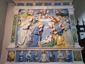 Luca della Robbia il giovane, Natività con san Francesco e sant’Antonio