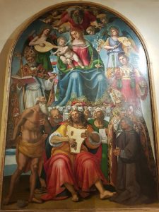 Luca Signorelli, Madonna in gloria col Bambino, santi e il committente Niccolò Gamurrini