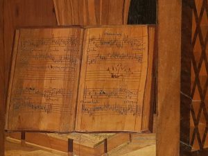 Studiolo di Urbino - dettaglio di un codice musicale