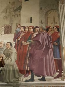 Domenico Ghirlandaio, cappella Sassetti, Scena della Conferma della Regola - dettaglio dei mariti delle figlie del Sassetti. All'estrema destra, il pittore con le mani sui fianchi