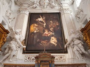Oratorio di san Lorenzo, riproduzione della Natività di Caravaggio