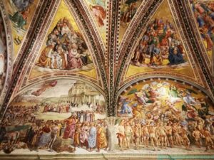 Cappella di San Brizio, Luca Signorelli, Storie dell'Anticristo (a sinistra), Paradiso (a destra). Nelle vele Dottori della chiesa (a sinistra), Apostoli (a destra)